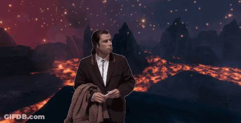Man In Suit And Tie In Front Of Lava Field GIF