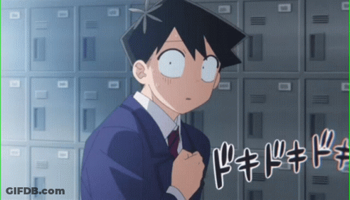 Man In Suit And Tie In Front Of Lockers With DK GIF