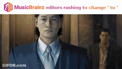 Man In Suit And Tie In Front Of Music Brainz Logo GIF