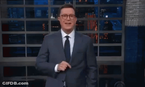 Man In Suit And Tie In Front Of No Sign GIF