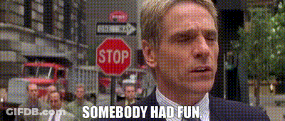 Man In Suit And Tie In Front Of Stop Sign GIF