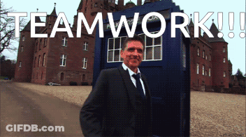 Man In Suit And Tie In Front Of Teamwork Box GIF
