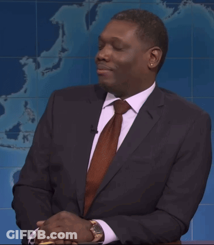 Man In Suit And Tie In Front Of World Map GIF