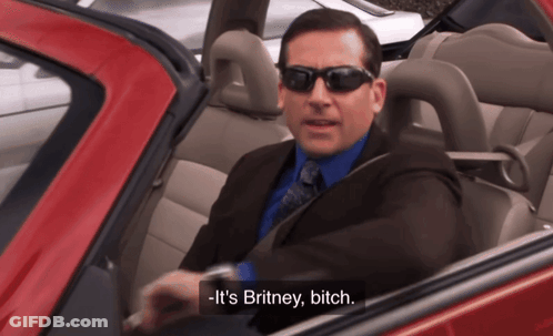 Man In Suit And Tie In Red Car Says Britney Bitch GIF