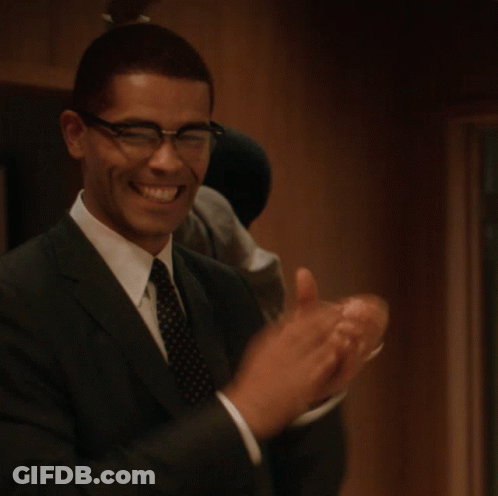Man In Suit And Tie Laughing GIF