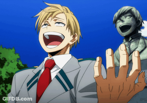 Man In Suit And Tie Laughing Beside Statue GIF
