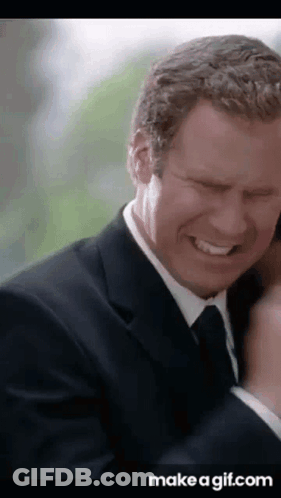 Man In Suit And Tie Laughing Eyes Closed GIF