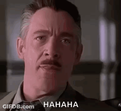 Man In Suit And Tie Laughing GIF