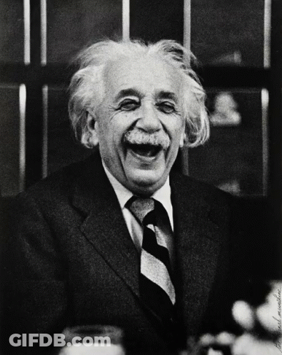 Man In Suit And Tie Laughing GIF