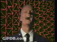 Man In Suit And Tie Laughing GIF