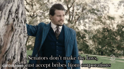 Man In Suit And Tie Leaning Against Tree Saying Senators GIF