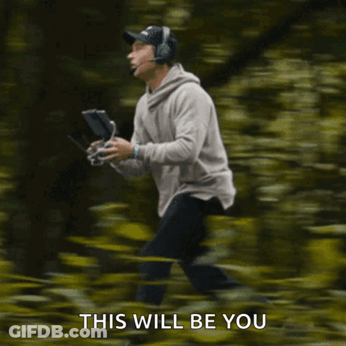 Man In Suit And Tie Leaving Wrestling Arena GIF