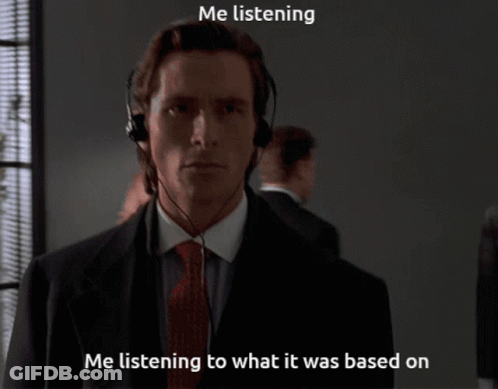 Man In Suit And Tie Listening GIF