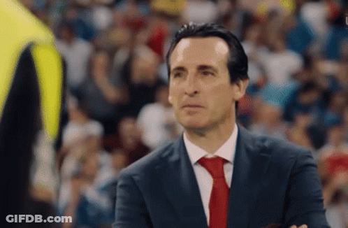 Man In Suit And Tie Looking GIF