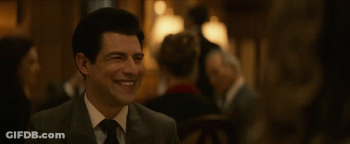 Man In Suit And Tie Looking GIF