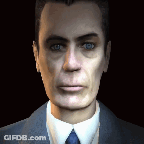 Man In Suit And Tie Looking At Camera GIF