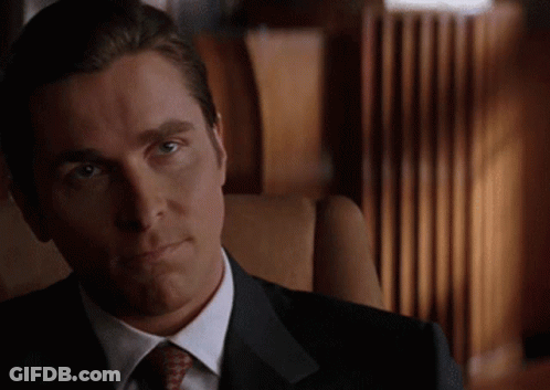Man In Suit And Tie Looking At Camera GIF