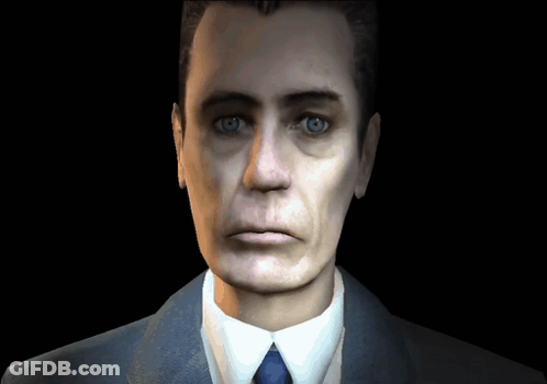 Man In Suit And Tie Looking At Camera GIF