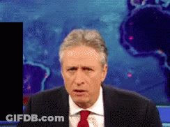 Man In Suit And Tie Looking At Camera GIF