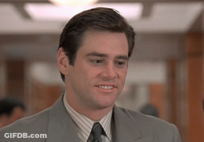 Man In Suit And Tie Looking At Camera GIF