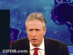 Man In Suit And Tie Looking At Camera GIF