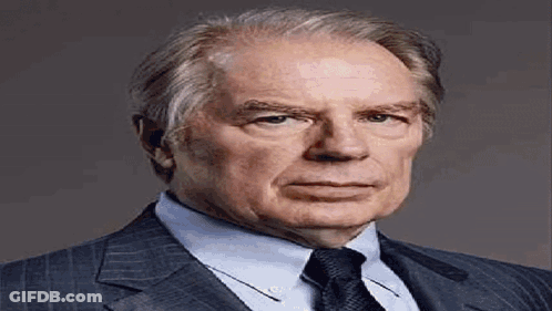 Man In Suit And Tie Looking At Camera GIF