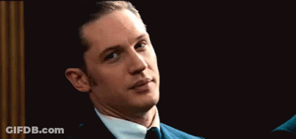Man In Suit And Tie Looking At Camera GIF