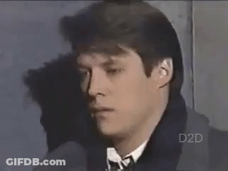 Man In Suit And Tie Looking At Camera GIF