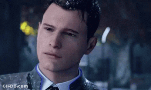Man In Suit And Tie Looking At Camera GIF