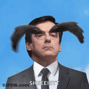 Man In Suit And Tie Looking At Something GIF
