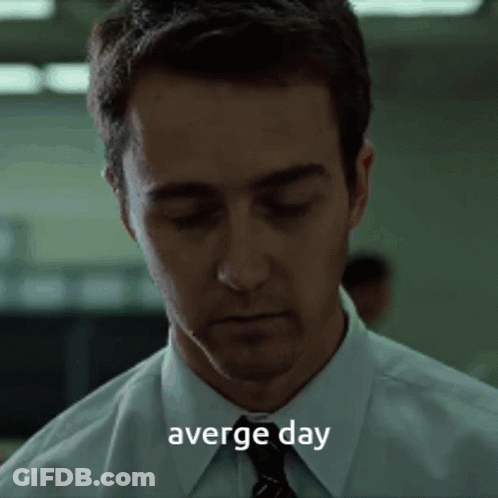 Man In Suit And Tie Looking Down Average Day GIF