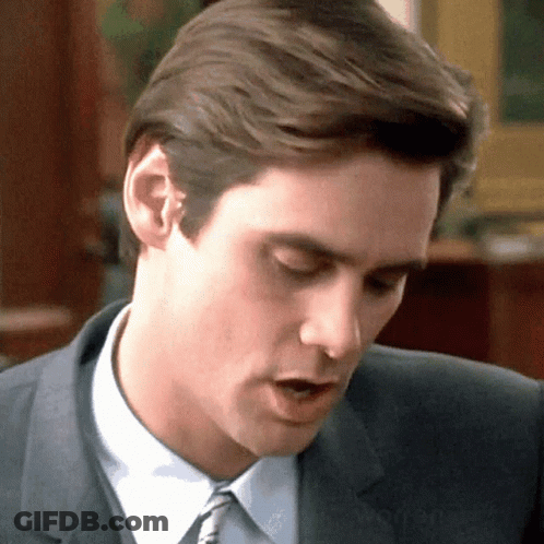 Man In Suit And Tie Looking Down GIF