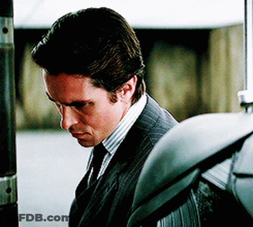 Man In Suit And Tie Looking Down GIF
