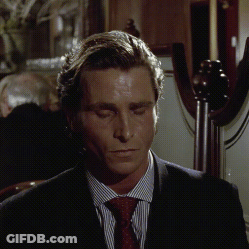 Man In Suit And Tie Looking Down GIF