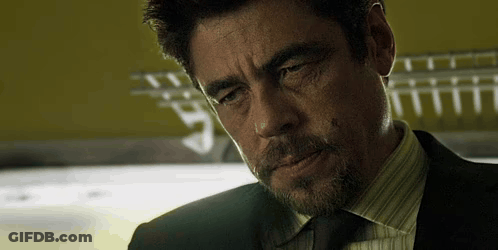 Man In Suit And Tie Looking Down GIF