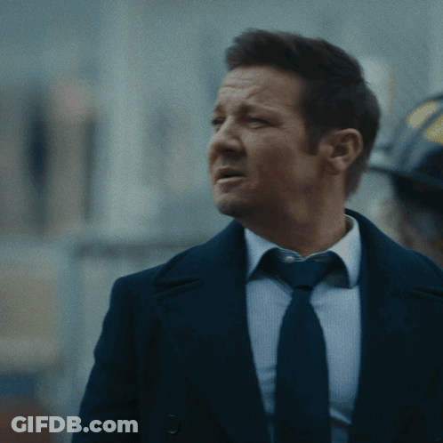 Man In Suit And Tie Looking Left GIF
