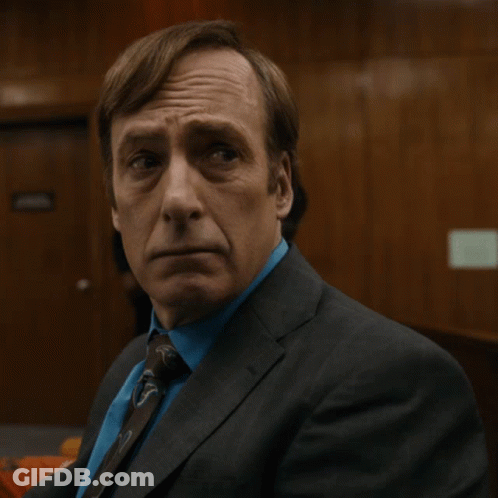 Man In Suit And Tie Looking Left GIF