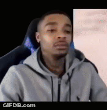 Man In Suit And Tie Looking Serious GIF