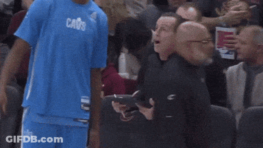 Man In Suit And Tie Looking Serious GIF