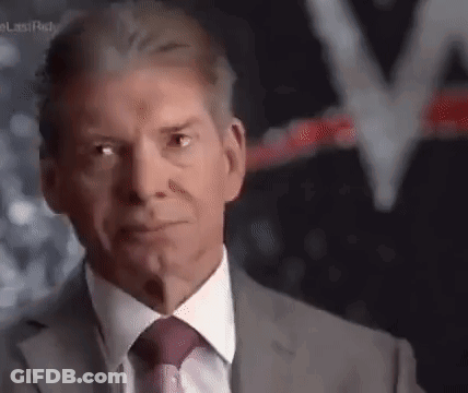 Man In Suit And Tie Looking Serious GIF