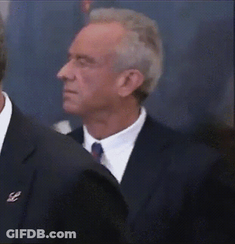 Man In Suit And Tie Looking Sideways GIF