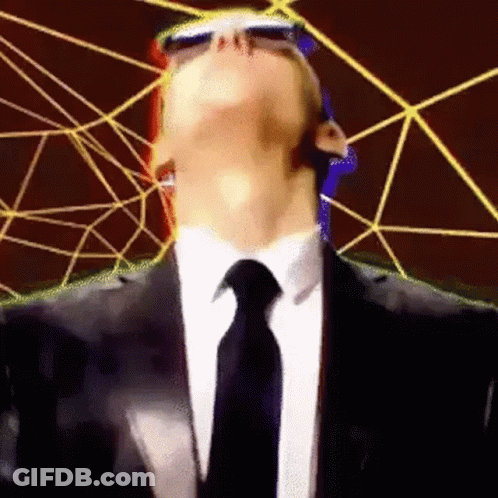 Man In Suit And Tie Looking Up With Sunglasses GIF