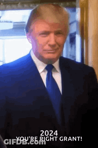 Man In Suit And Tie Making A Face GIF