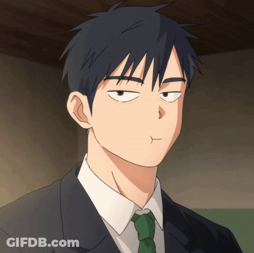 Man In Suit And Tie Making A Face GIF