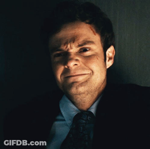 Man In Suit And Tie Making Face GIF