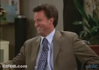 Man In Suit And Tie Making Face GIF