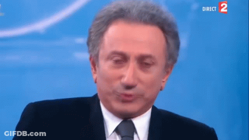 Man In Suit And Tie Making Face Direct 2 GIF