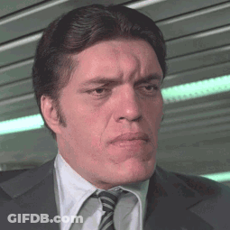 Man In Suit And Tie Making Face GIF