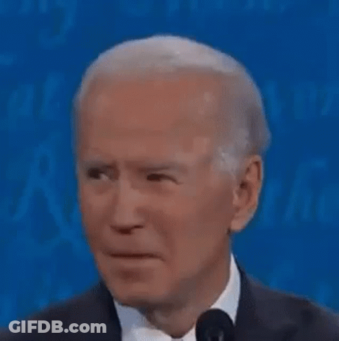 Man In Suit And Tie Making Face GIF