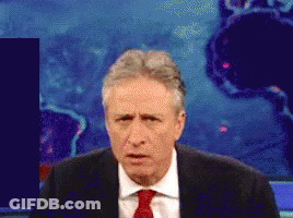 Man In Suit And Tie Making Face GIF
